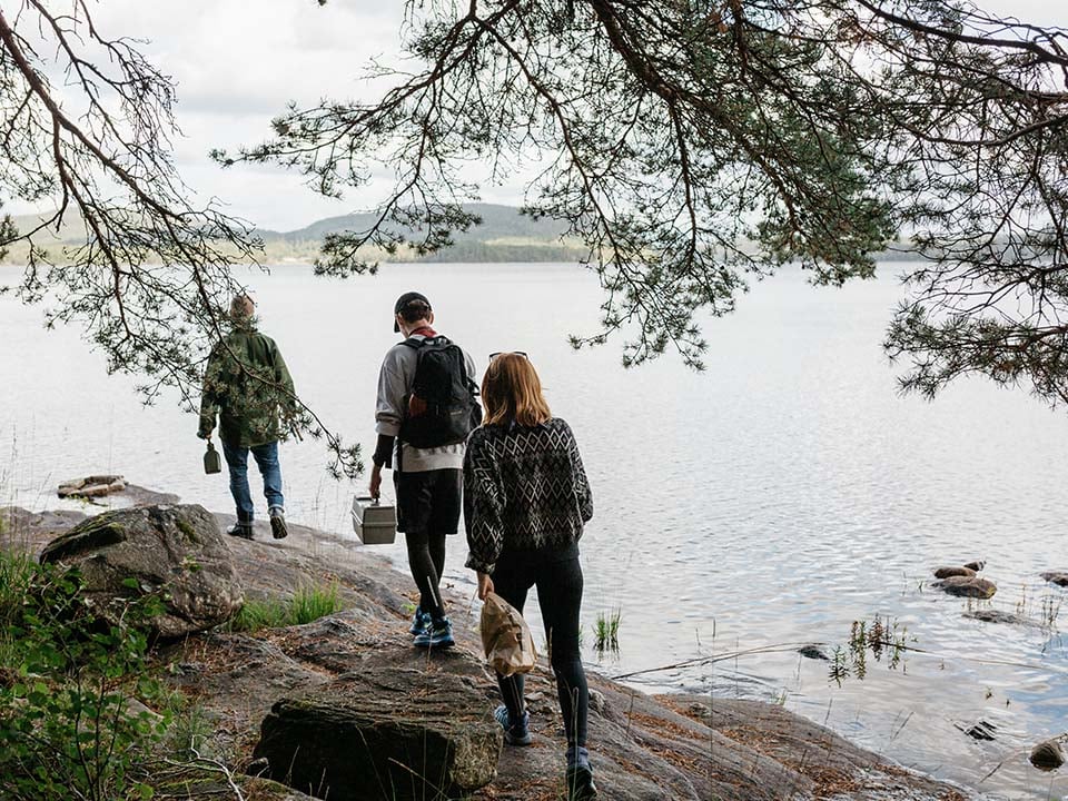 Tre personer på fisketur